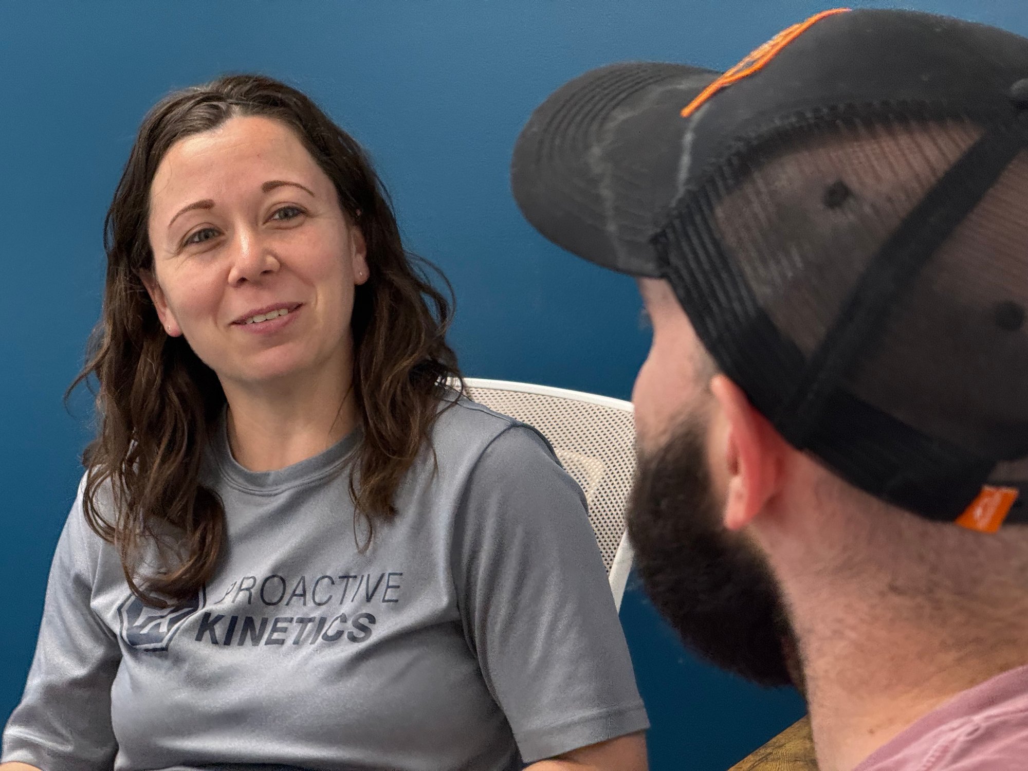 Dr. Sam talking to client
