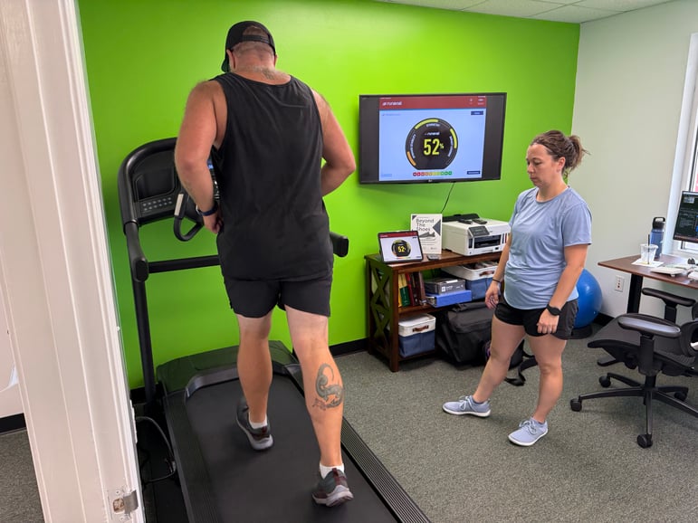 Athlete performing movement assessment at a CrossFit-focused physical therapy clinic in Murfreesboro