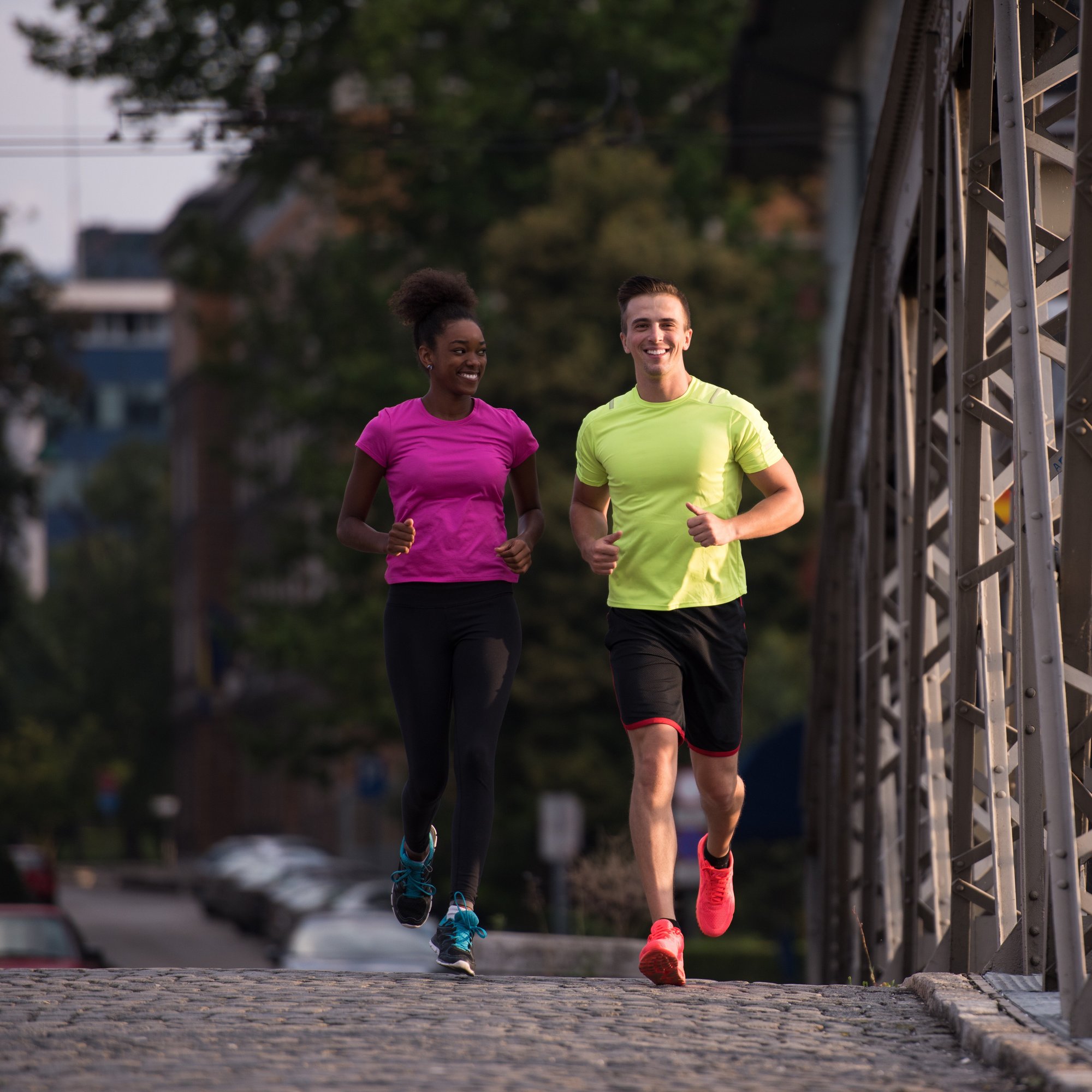 multiethnic-couple-jogging-in-the-city-2025-01-15-14-38-44-utc
