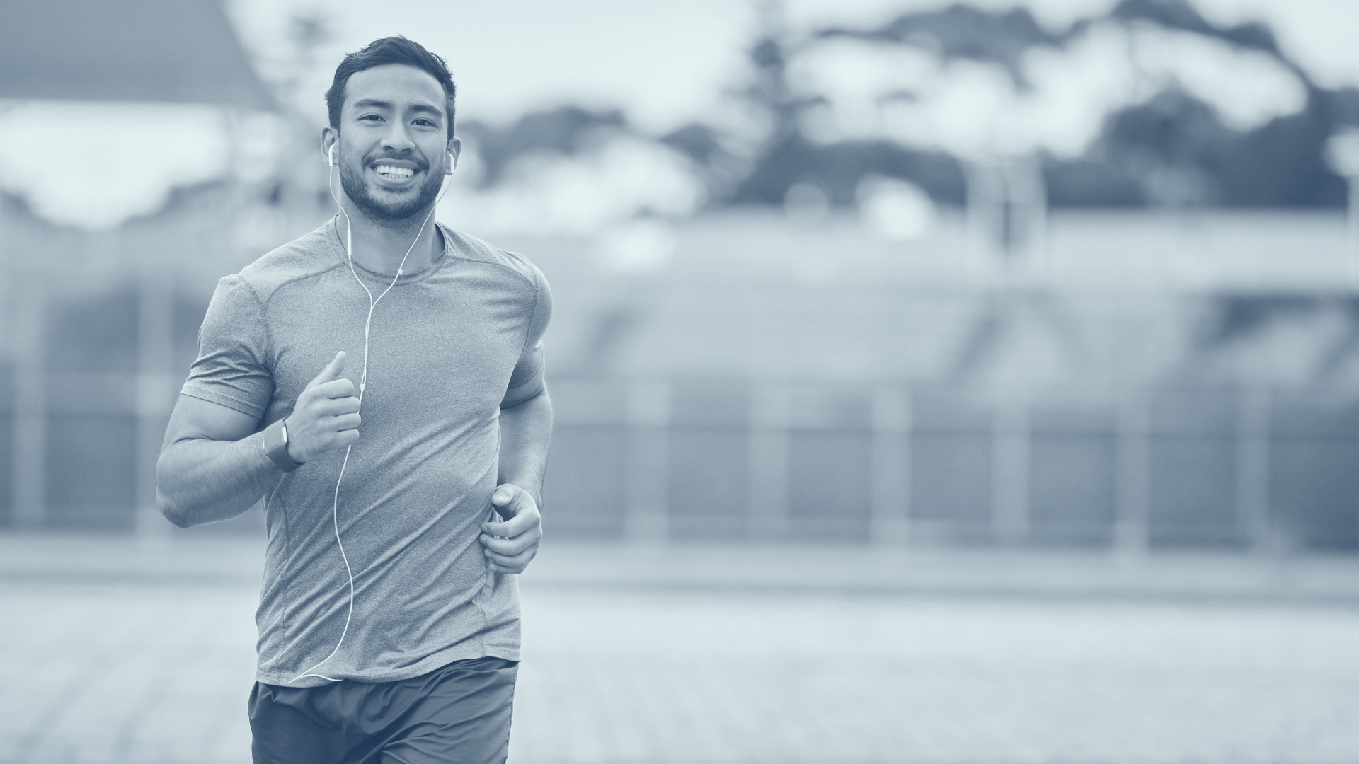 man running with smile on his face