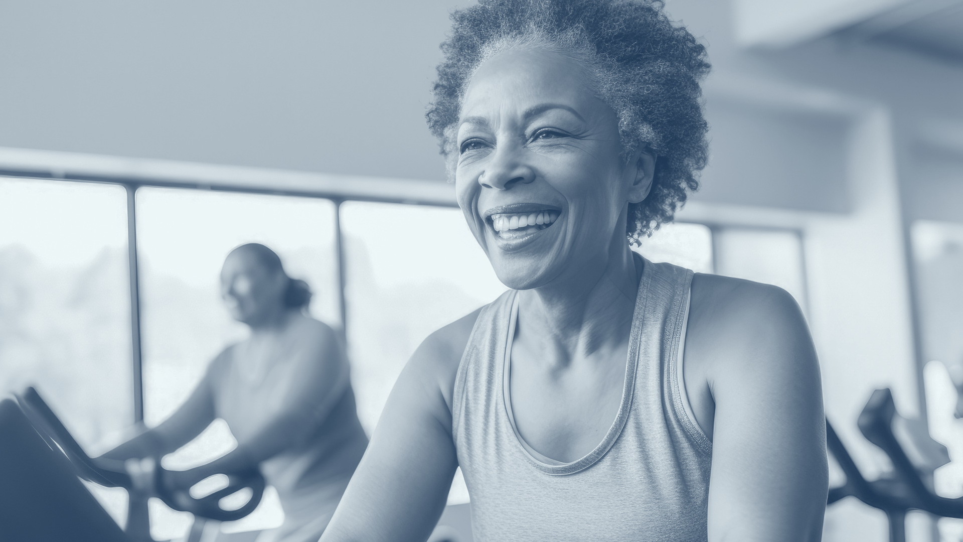 woman working out in a cycle class